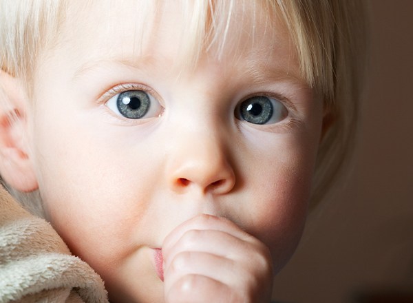 Little boy sucking his thumb