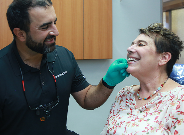 Dentist examining dental patient