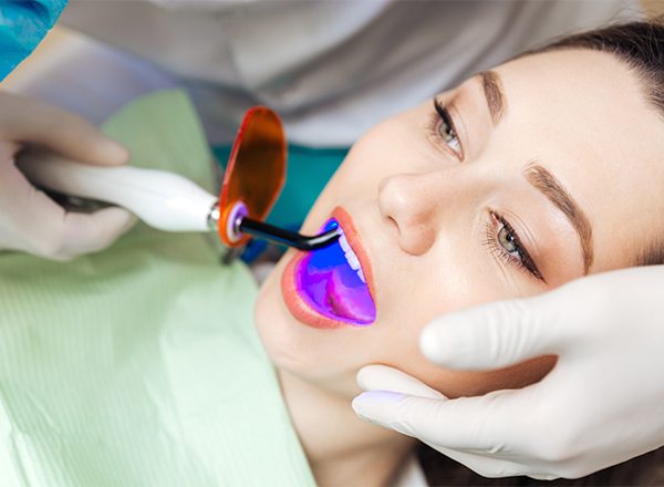 Patient receiving dental bonding