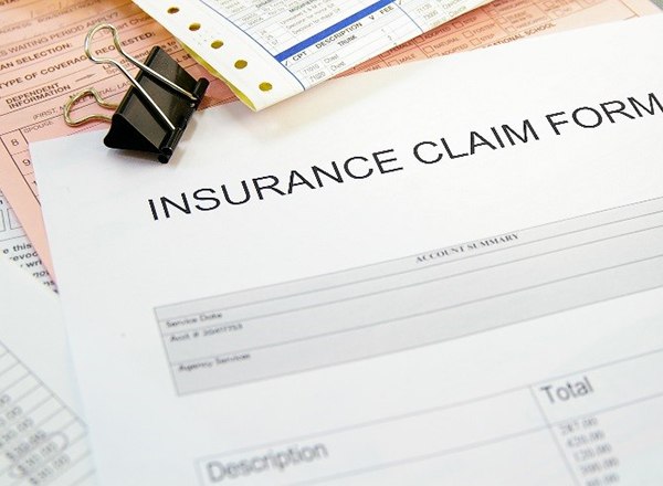 Insurance claim form on desk