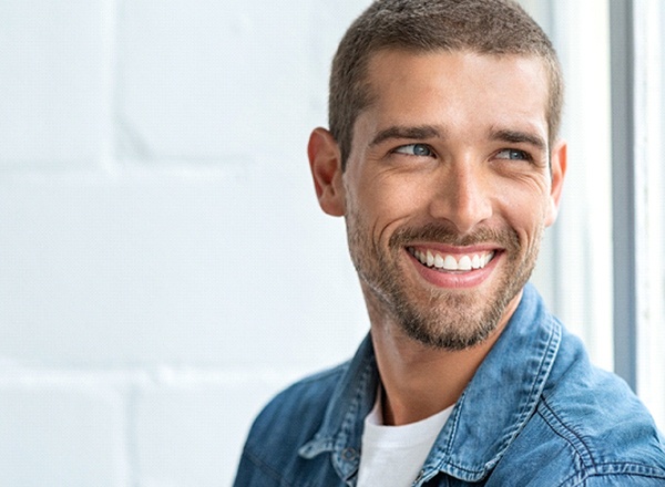 smiling man in dental office