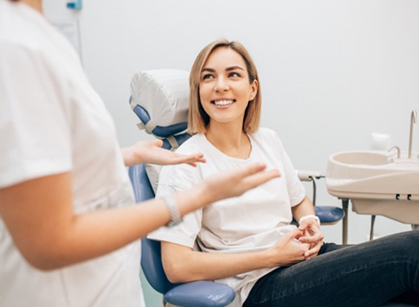 patient talking to dentist  