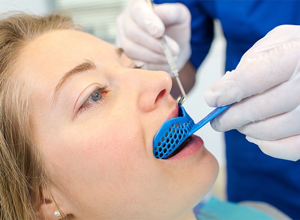 Patient receiving fluoride treatment