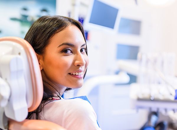 Patient smiling in treatment chair