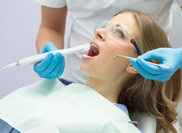 Dentist capturing intraoral images