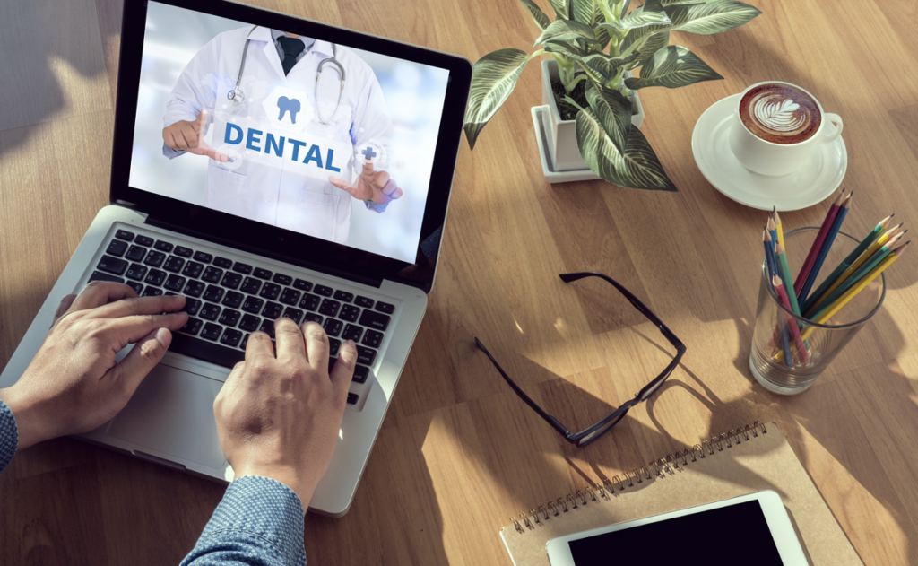 scheduling dental checkup on laptop