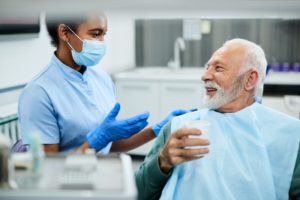 man asking dentist questions