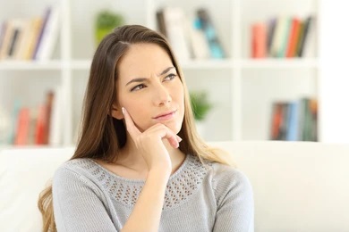 patient wondering about dental implants for front teeth