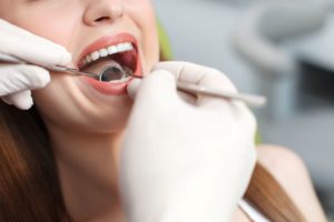 Woman having dental exam