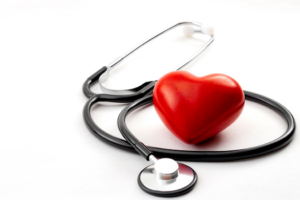 a stethoscope and a model heart